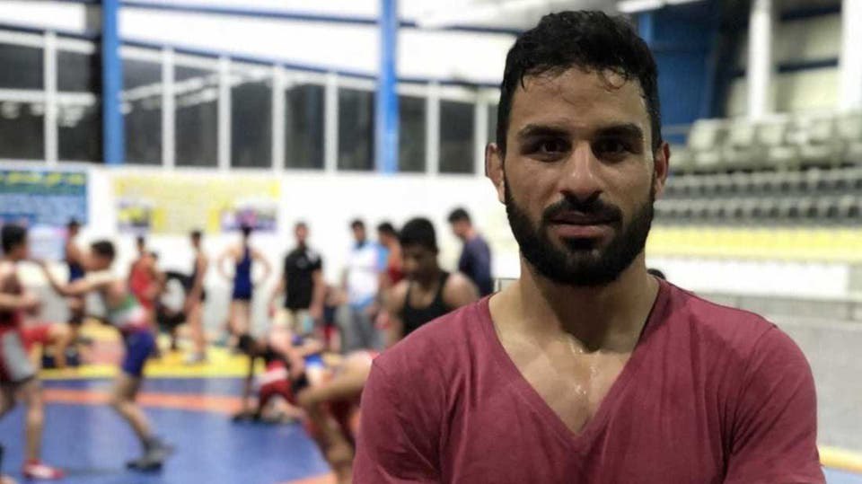 وسط ضجة وردود افعال غاضبة.. إيران أعدمت المصارع أفكاري على عجل 1 وسط ضجة وردود افعال غاضبة.. إيران أعدمت المصارع أفكاري على عجل